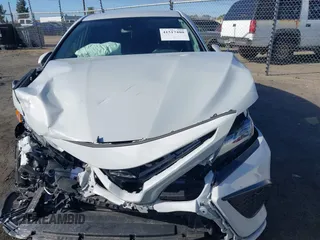 2023 Toyota Camry SE with VIN 4T1G11AK8PU117566, listed as a IAAI auction lot 41517480 with Not Provided miles and . Bid and sale history available at DreamBid. Image 12.
