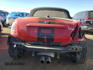2013 MINI Roadster S z VIN WMWSY3C53DT566214, wystawiony jako Copart lot #83463854 z przebiegiem 69 877 mil mil oraz Szkoda całkowita • Salvage title. Historia ofert i sprzedaży dostępna na DreamBid. Obrazek 6.