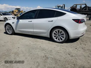 2021 Tesla Model 3 Standard Range Plus with VIN 5YJ3E1EA4MF849187, listed as a Copart auction lot 51689605 with 77,266 mi miles and Salvage Title. Bid and sale history available at carsss.com. Image 2.