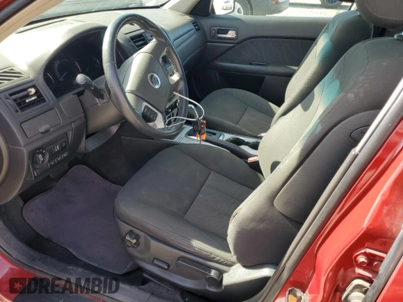 2010 Mercury Milan with VIN 3MEHM0HA0AR621341, listed as a Copart auction lot 56994365 with 218,312 mi miles and Salvage title. Bid and sale history available at DreamBid. Image 7.