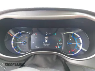 2023 Chrysler Pacifica Hybrid Touring L with VIN 2C4RC1L77PR541513, listed as a IAAI auction lot 42433421 with 53,979 mi miles and . Bid and sale history available at DreamBid. Image 7.