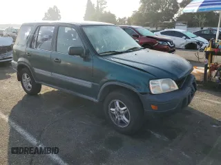2000 Honda CR-V EX with VIN JHLRD1861YC020765, listed as a Copart auction lot 74510874 with 125,654 mi miles and Salvage Title. Bid and sale history available at carsss.com. Image 4.