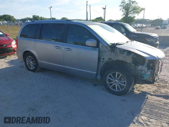 2018 Dodge Grand Caravan SXT with VIN 2C4RDGCG5JR267428, listed as a IAAI auction lot 41877661 with 103,633 mi miles and . Bid and sale history available at DreamBid. Image 1.