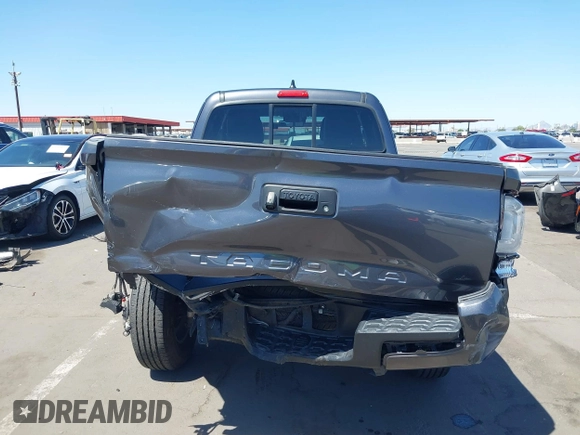 2020 Toyota Tacoma SR with VIN 3TYRX5GN4LT003040, listed as a IAAI auction lot 42121503 with 49,858 mi miles and . Bid and sale history available at DreamBid. Image 17.