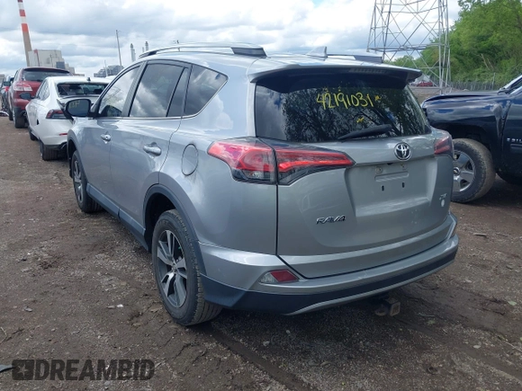2018 Toyota RAV4 XLE z VIN 2T3WFREV1JW427878, wystawiony jako IAAI lot #42191031 z przebiegiem 97 264 mil mil oraz . Historia ofert i sprzedaży dostępna na DreamBid. Obrazek 3.
