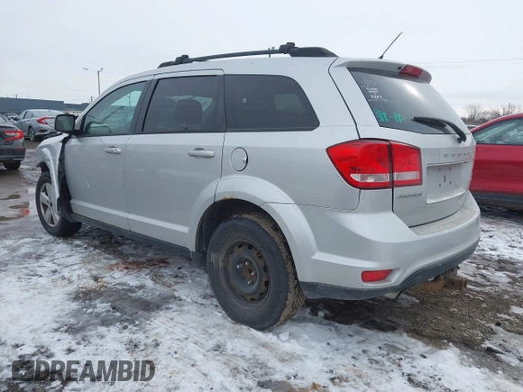 2012 Dodge Journey SXT with VIN 3C4PDCCG6CT135911, listed as a IAAI auction lot 41448632 with 179,440 mi miles and . Bid and sale history available at DreamBid. Image 3.