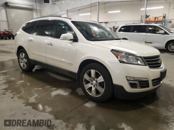 2015 Chevrolet Traverse LTZ with VIN 1GNKVJKD3FJ212675, listed as a Copart auction lot 49796595 with 157,166 mi miles and Salvage Title. Bid and sale history available at DreamBid. Image 4.