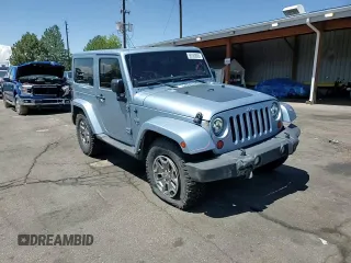 2012 Jeep Wrangler Arctic z VIN 1C4AJWBGXCL156600, wystawiony jako Copart lot #56369065 z przebiegiem 216 808 mil mil oraz Szkoda całkowita • Salvage title. Historia ofert i sprzedaży dostępna na DreamBid. Obrazek 13.