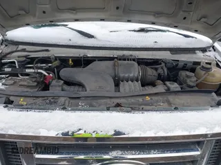 2011 Ford Econoline Cargo Commercial with VIN 1FTNE1EWXBDA35585, listed as a IAAI auction lot 41349320 with 122,311 mi miles and . Bid and sale history available at carsss.com. Image 10.