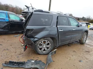 2014 GMC Acadia SLT z VIN 1GKKRRKD1EJ291455, wystawiony jako IAAI lot #41546542 z przebiegiem 161 242 mil mil oraz . Historia ofert i sprzedaży dostępna na DreamBid. Obrazek 4.