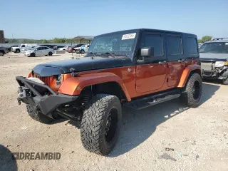 2012 Jeep Wrangler Unlimited Sport with VIN 1C4BJWDG0CL200802, listed as a Copart auction lot 63822365 with 116,501 mi miles and Salvage title. Bid and sale history available at DreamBid. Image 1.
