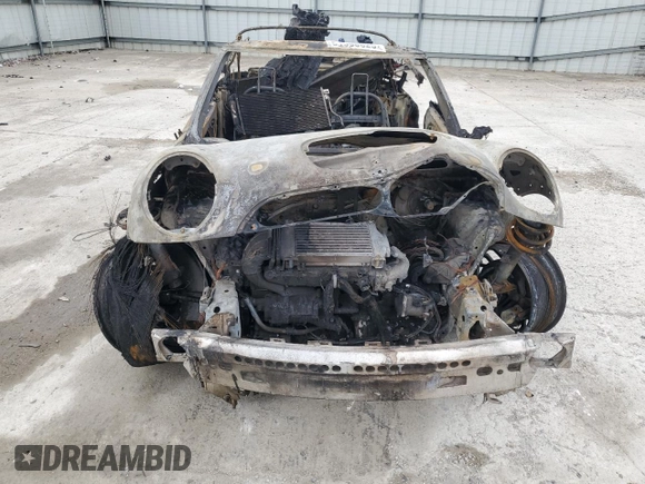 2006 MINI Convertible S with VIN WMWRH33536TK59031, listed as a Copart auction lot 51598825 with Not provided miles and Salvage title. Bid and sale history available at DreamBid. Image 5.