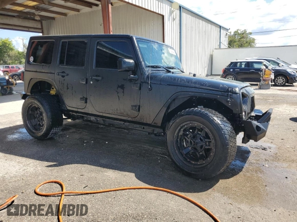 2018 Jeep Wrangler JK Unlimited Sport S with VIN 1C4BJWDG7JL814226, listed as a Copart auction lot 72442484 with 49,658 mi miles and Salvage Title. Bid and sale history available at carsss.com. Image 4.