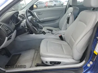 2009 BMW 1 Series 128i with VIN WBAUP93529VF49255, listed as a Copart auction lot 51100045 with 153,841 mi miles and Clean title. Bid and sale history available at DreamBid. Image 7.
