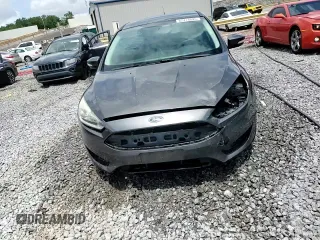 2015 Ford Focus Titanium z VIN 1FADP3N28FL239706, wystawiony jako Copart lot #62478895 z przebiegiem 143 536 mil mil oraz Szkoda całkowita • Salvage title. Historia ofert i sprzedaży dostępna na DreamBid. Obrazek 14.