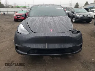 2025 Tesla Model Y Long Range z VIN 7SAYGDED9SF269767, wystawiony jako Copart lot #51588985 z przebiegiem 1 943 mil mil oraz Szkoda całkowita • Salvage title. Historia ofert i sprzedaży dostępna na DreamBid. Obrazek 5.
