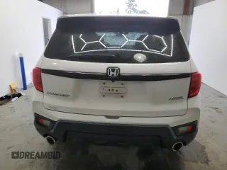 2023 Honda Passport EX-L with VIN 5FNYF8H56PB008485, listed as a Copart auction lot 47852225 with 52,543 mi miles and Salvage Title. Bid and sale history available at carsss.com. Image 6.