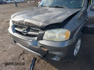 2006 Mazda Tribute LX with VIN 4F2YZ94126KM19822, listed as a IAAI auction lot 41534784 with 193,467 mi miles and . Bid and sale history available at DreamBid. Image 6.