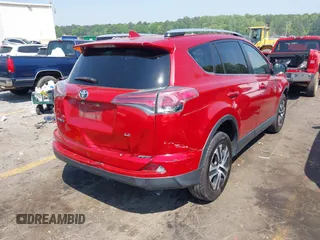 2016 Toyota RAV4 LE with VIN JTMZFREV1GJ098247, listed as a IAAI auction lot 42065800 with 199,172 mi miles and . Bid and sale history available at DreamBid. Image 4.