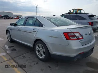 2015 Ford Taurus SEL z VIN 1FAHP2E88FG133328, wystawiony jako IAAI lot #42179649 z przebiegiem 127 171 mil mil oraz . Historia ofert i sprzedaży dostępna na DreamBid. Obrazek 3.