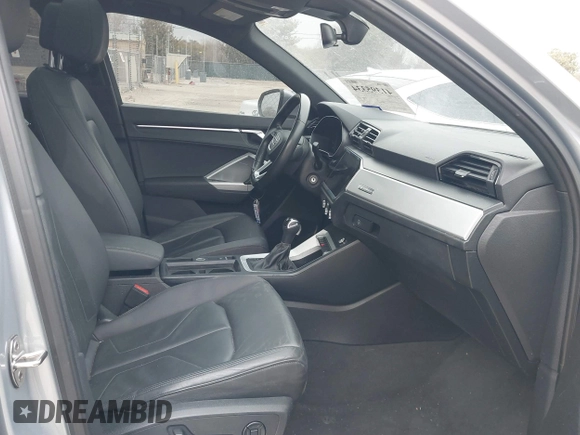 2021 Audi Q3 Premium with VIN WA1AUCF35M1066713, listed as a IAAI auction lot 41395334 with 82,724 mi miles and . Bid and sale history available at DreamBid. Image 5.