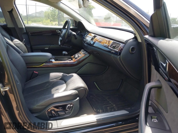 2011 Audi A8 with VIN WAURVAFD6BN005425, listed as a IAAI auction lot 42623409 with 264,365 mi miles and . Bid and sale history available at DreamBid. Image 5.