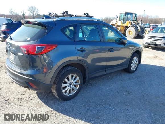 2013 Mazda CX-5 Sport z VIN JM3KE4BE3D0141748, wystawiony jako IAAI lot #41836498 z przebiegiem 163 118 mil mil oraz . Historia ofert i sprzedaży dostępna na DreamBid. Obrazek 4.