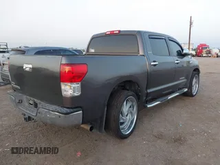 2013 Toyota Tundra Limited with VIN 5TFFY5F19DX137337, listed as a IAAI auction lot 41848771 with 182,886 mi miles and . Bid and sale history available at DreamBid. Image 4.