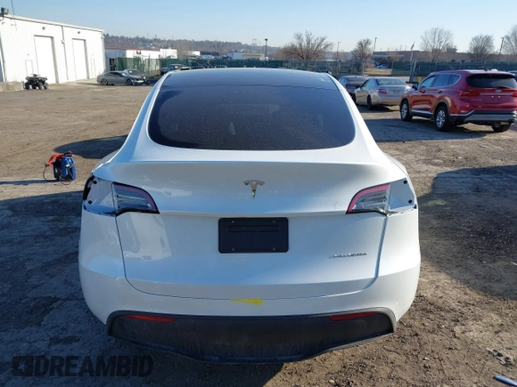 2023 Tesla Model Y Long Range z VIN 7SAYGDEE5PF765326, wystawiony jako IAAI lot #41757113 z przebiegiem 10 461 mil mil oraz . Historia ofert i sprzedaży dostępna na DreamBid. Obrazek 17.