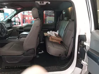 2019 Ford F-150 XL z VIN 1FTEX1C48KKE41467, wystawiony jako IAAI lot #42518514 z przebiegiem 107 651 mil mil oraz . Historia ofert i sprzedaży dostępna na DreamBid. Obrazek 5.