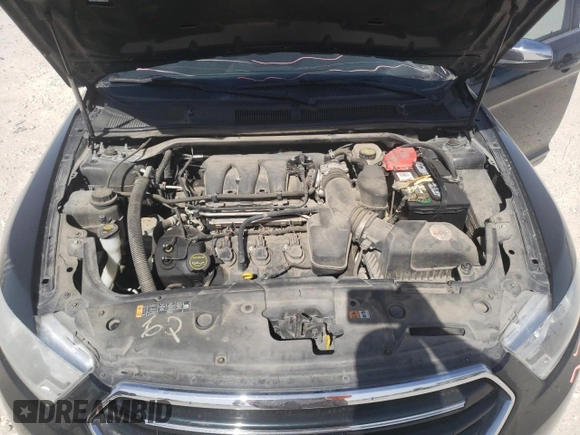 2015 Ford Taurus Limited with VIN 1FAHP2F83FG106102, listed as a Copart auction lot 49819005 with 100,925 mi miles and Salvage Title. Bid and sale history available at DreamBid. Image 11.