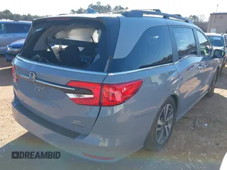 2023 Honda Odyssey Touring with VIN 5FNRL6H84PB005208, listed as a IAAI auction lot 41374452 with 60,288 mi miles and . Bid and sale history available at DreamBid. Image 4.