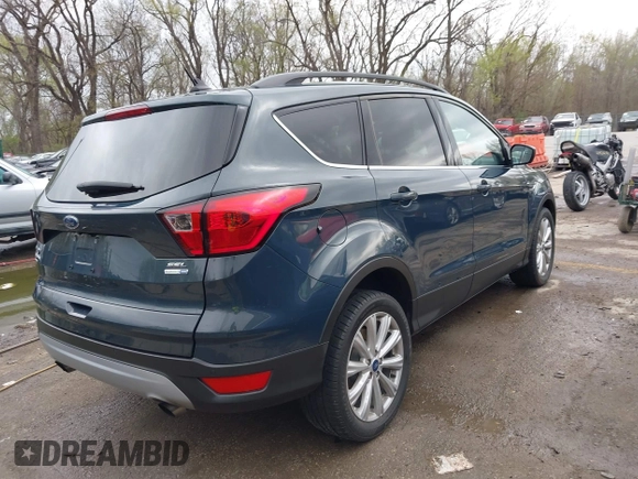 2019 Ford Escape SEL with VIN 1FMCU9HD3KUA54073, listed as a IAAI auction lot 41917955 with 101,283 mi miles. Bid and sale history available at carsss.com. Image 4.