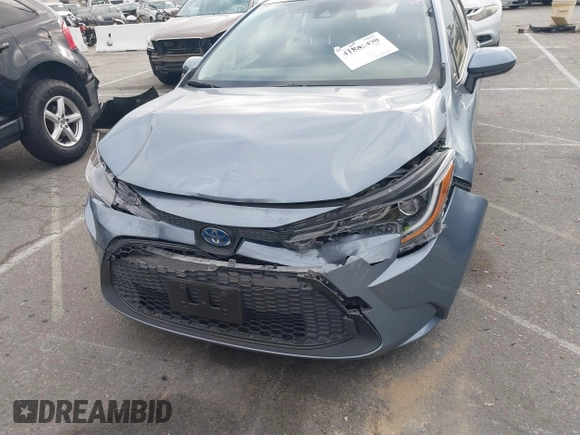 2022 Toyota Corolla Hybrid LE with VIN JTDEAMDE4NJ041913, listed as a IAAI auction lot 41883490 with 23,063 mi miles. Bid and sale history available at carsss.com. Image 6.