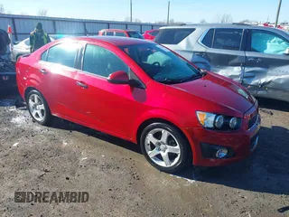 2014 Chevrolet Sonic LTZ with VIN 1G1JE5SB7E4177798, listed as a IAAI auction lot 41241858 with 46,858 mi miles. Bid and sale history available at carsss.com. Image 1.