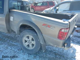 2003 Ford Ranger XL Fleet with VIN 1FTZR45E13TA21144, listed as a IAAI auction lot 41641064 with 139,921 mi miles. Bid and sale history available at carsss.com. Image 6.