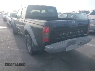 2003 Nissan Frontier XE with VIN 1N6ED27T23C458693, listed as a IAAI auction lot 41932151 with 257,185 mi miles and . Bid and sale history available at DreamBid. Image 3.