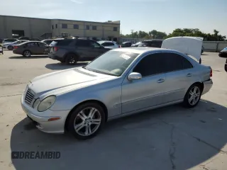 2004 Mercedes-Benz E-Class 5.0L with VIN WDBUF70J84A492244, listed as a Copart auction lot 61143664 with 165,750 mi miles and Salvage Title. Bid and sale history available at carsss.com. Image 1.