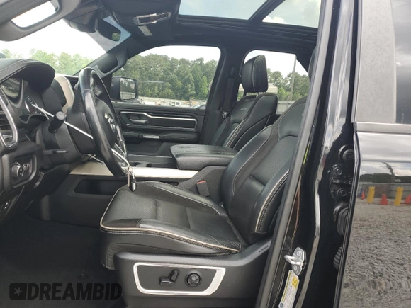 2019 Ram 1500 Laramie with VIN 1C6SRFJT9KN772570, listed as a Copart auction lot 60721145 with 82,599 mi miles and Salvage title. Bid and sale history available at DreamBid. Image 7.