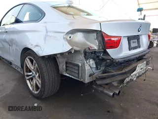 2014 BMW 4 Series 428i with VIN WBA3N7C58EF719514, listed as a IAAI auction lot 42310537 with 82,573 mi miles and . Bid and sale history available at DreamBid. Image 6.