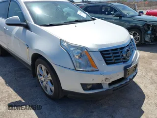 2014 Cadillac SRX Performance Collection with VIN 3GYFNFE35ES582897, listed as a IAAI auction lot 41978361 with 144,116 mi miles and . Bid and sale history available at DreamBid. Image 6.