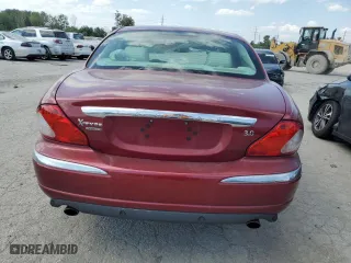 2004 Jaguar X-Type with VIN SAJEA51CX4WD60022, listed as a Copart auction lot 70491824 with 121,443 mi miles and Salvage Title. Bid and sale history available at carsss.com. Image 6.