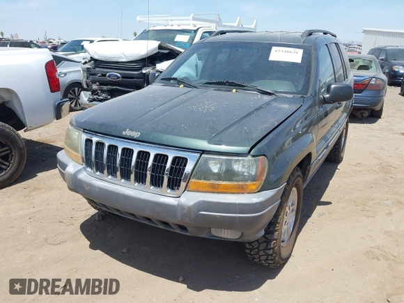 2001 Jeep Grand Cherokee Laredo with VIN 1J4GW48N51C612600, listed as a IAAI auction lot 42348631 with 165,918 mi miles and . Bid and sale history available at DreamBid. Image 6.