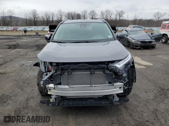 2024 Toyota RAV4 XLE with VIN 2T3P1RFV4RC469850, listed as a Copart auction lot 52012855 with 4,671 mi miles and Salvage Title. Bid and sale history available at DreamBid. Image 5.