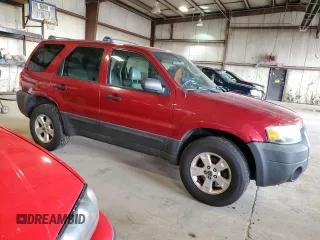 2005 Ford Escape XLT with VIN 1FMYU931X5KE17875, listed as a Copart auction lot 67502114 with 131,303 mi miles and Salvage Title. Bid and sale history available at carsss.com. Image 4.