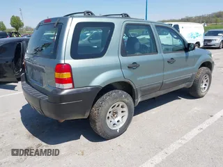 2005 Ford Escape XLS Value z VIN 1FMYU92Z75DA03268, wystawiony jako IAAI lot #42051311 z przebiegiem 124 985 mil mil oraz . Historia ofert i sprzedaży dostępna na DreamBid. Obrazek 4.