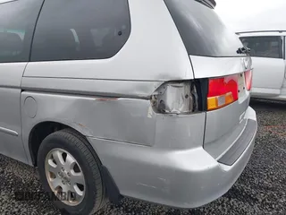 2003 Honda Odyssey EX-L z VIN 5FNRL18033B042810, wystawiony jako IAAI lot #42229495 z przebiegiem 231 682 mil mil oraz . Historia ofert i sprzedaży dostępna na DreamBid. Obrazek 14.