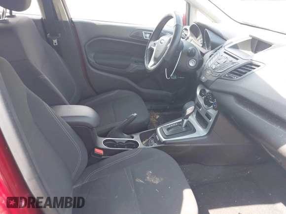2016 Ford Fiesta SE z VIN 3FADP4EJ4GM178707, wystawiony jako IAAI lot #42095480 z przebiegiem 96 454 mil mil oraz . Historia ofert i sprzedaży dostępna na DreamBid. Obrazek 5.
