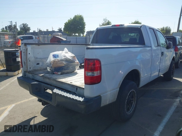 2007 Ford F-150 XLT with VIN 1FTPX14527KD42148, listed as a IAAI auction lot 42077816 with 267,360 mi miles. Bid and sale history available at carsss.com. Image 4.
