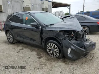 2020 Ford Escape Titanium with VIN 1FMCU9J97LUA59056, listed as a Copart auction lot 58445885 with Not provided miles and Salvage title. Bid and sale history available at DreamBid. Image 4.